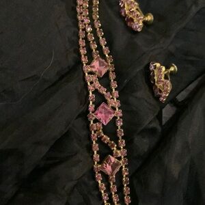 Vintage Pink Aurora Borealis bracelet and earrings . Marked Cosmopolitan.